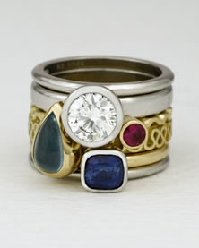 'Stacking Ring multi-stone' in platinum and 18K gold with 1.25ct diamond, Ruby, blue Sapphire and Aqua